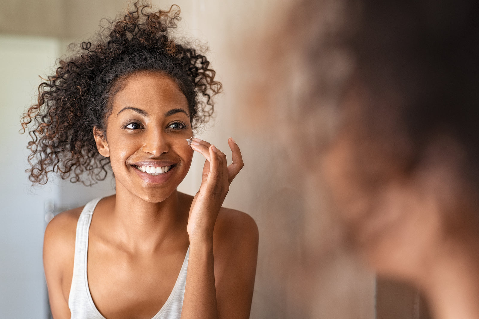 Woman using Cosmedica Skincare Retinol Night Cream